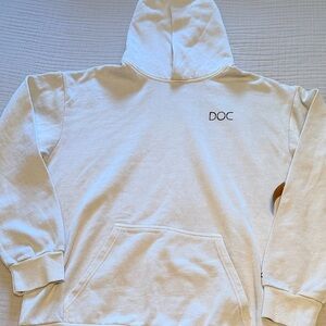 Men's Cream colored hoodie with Doc logo